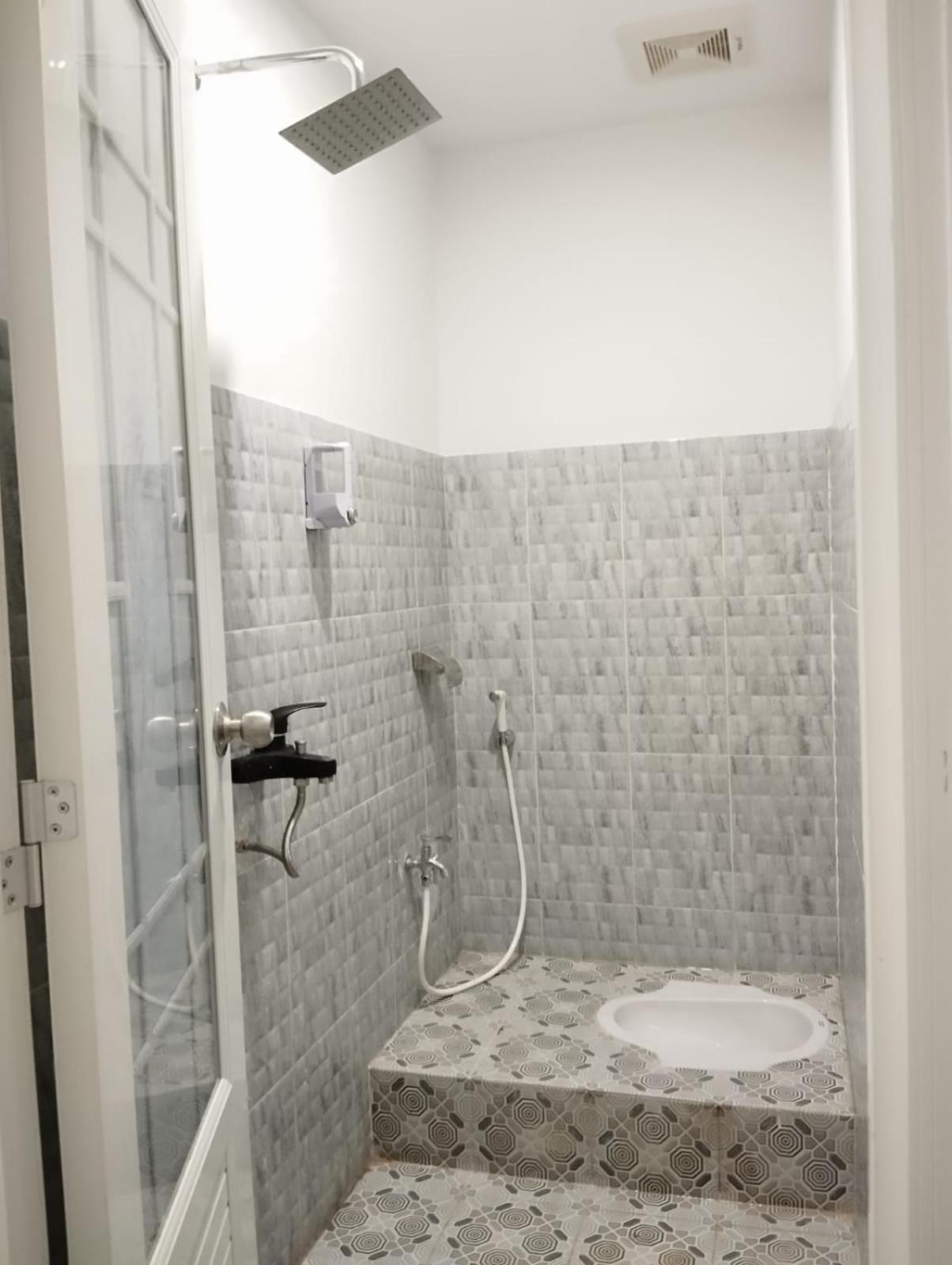 Kareem Syariah Hostel ブキティンギ エクステリア 写真